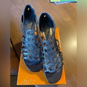 Silver/ Pewter dress shoes. Worn once to sit at a wedding. Practically new.